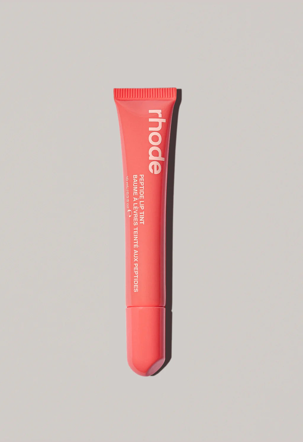 “Peach pit” peptide lip tint Rhode